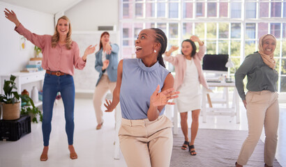 Business, women and group dance for fun celebration in a creative office for campaign success with diverse staff. Joy, excitement and dancing with a multicultural team of ladies celebrating