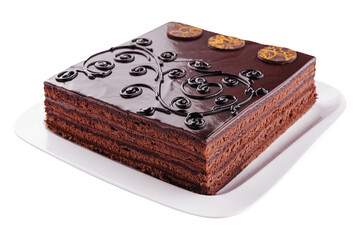 cake on white plate with topping chocolate