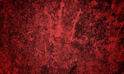 Obraz premium A textured background featuring deep red tones with a distressed, grunge appearance. The surface shows scratches and uneven patterns, creating a vintage feel.