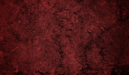 A textured background featuring deep red tones with a distressed, grunge appearance. The surface shows scratches and uneven patterns, creating a vintage feel.