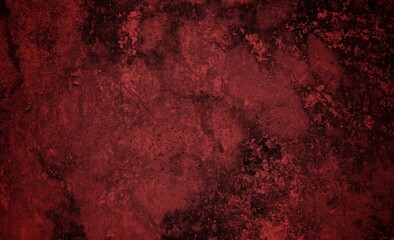 A textured background featuring deep red tones with a distressed, grunge appearance. The surface shows scratches and uneven patterns, creating a vintage feel.