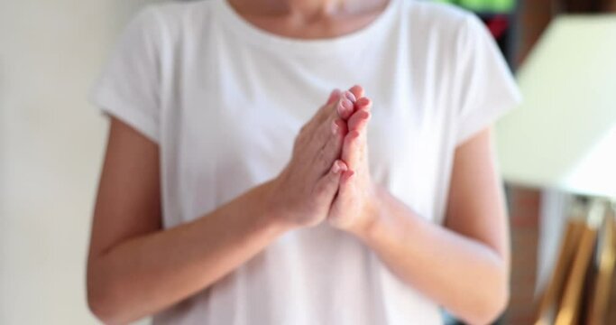 Female hands massage palms closed and nervous gesture