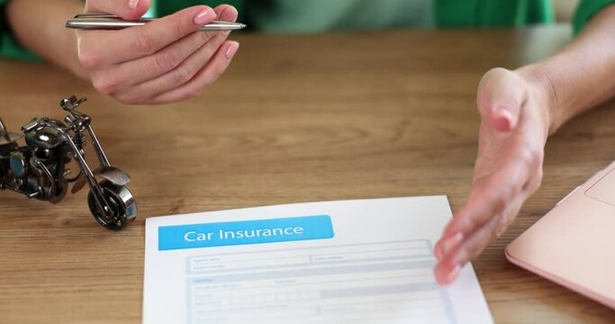 Sales representatives submit contractual insurance documents for auto insurance