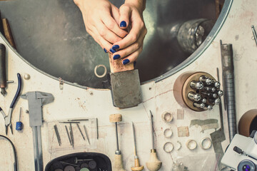 Close up jewelry maker tools concept photo. Craftsmanship. Work space. Top view photography with work table on background. High quality picture for wallpaper, travel blog, magazine, article