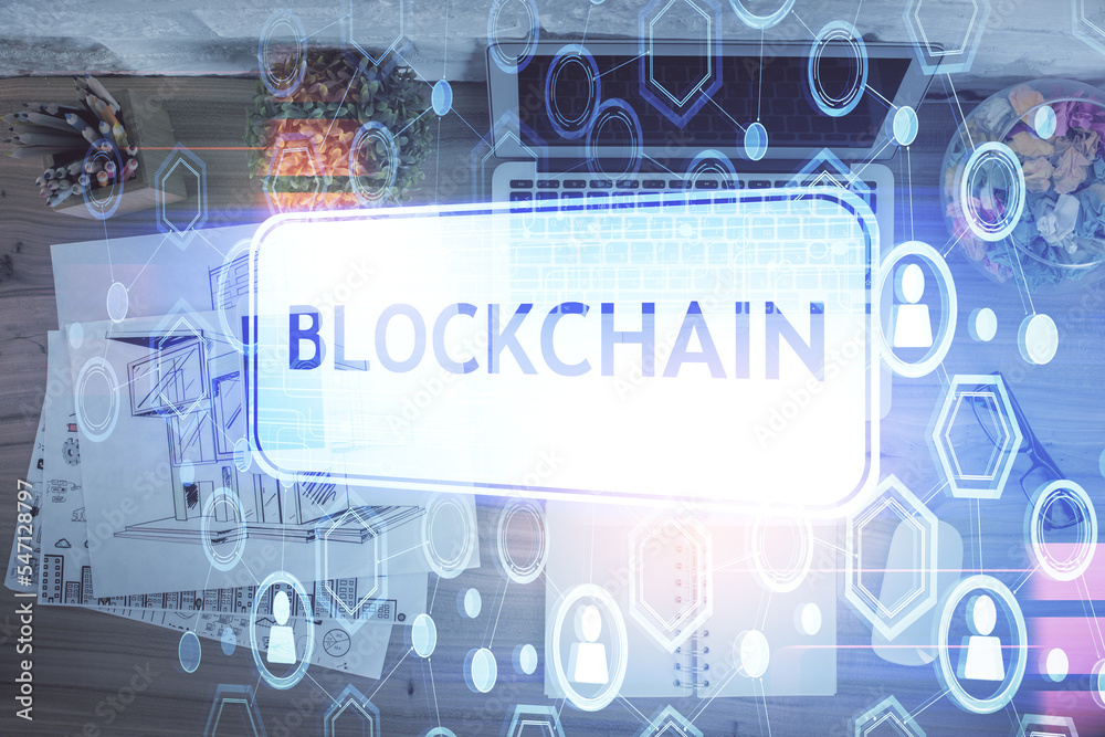 Poster blockchain theme hologram drawings over computer on the desktop background. top view. double exposur