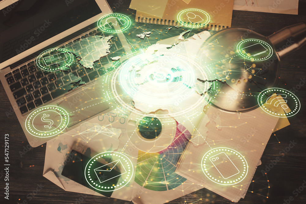 Poster social network hologram drawings over computer on the desktop background. top view. double exposure.