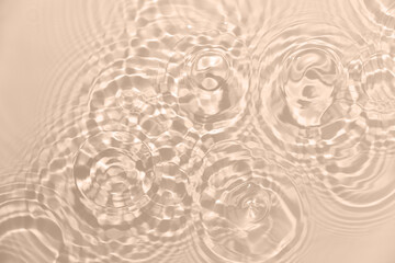 Fresh water background. Pattern with clear rippled water texture in beige, neutral color. Top view