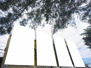 mockup of empty billboards on the side of the highway, blank advertising poster templates, information banner placeholder mock ups