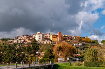 Santa Maria a Monte, Pisa, Italy, with autumn colors under a dramatic sky