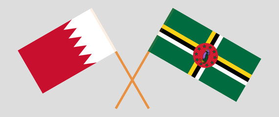 Crossed flags of Bahrain and Dominica. Official colors. Correct proportion