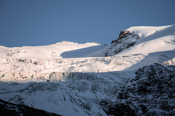 Detail shot of the summit of the Forni Glacier during the last sunlight of the day, Northern Italy