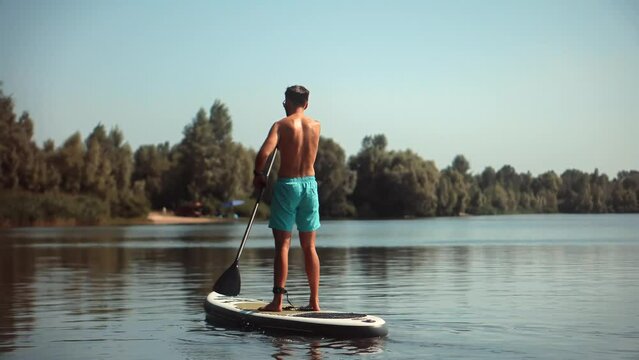 sup surfing activity. inflatable board paddle rowing surf