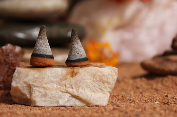 Aragonite Crystal With Incense Cones on Australian Red Sand