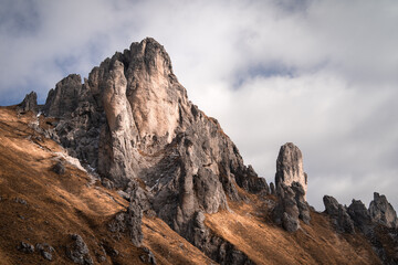 Sharp rock formations in the mountains near Lake Como  during an autumnal day