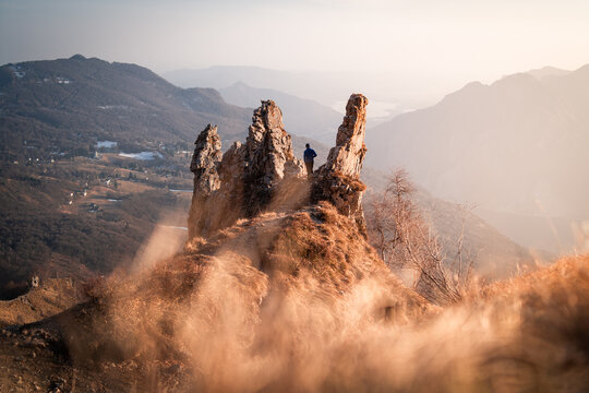 Sunset scene of a rocky cliff that overlooks the area near the Lake Como, Northern Italy