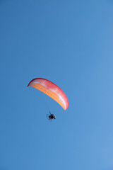 Parasailing over Las Flores Beach, on a very hot day during the summer at Maldonado, Uruguay.