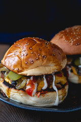 Cheeseburger with fried onions and mushrooms