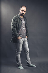 Fototapeta premium Full body portrait of a man in socks
