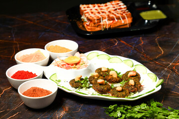 Indian Side Dish Popular Chaat Snacks Aaloo Aalu Mashed Boiled Potato Tikki With Spicy Green Chutney And Tomato Sauce 