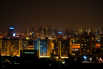 Fototapeta na wymiar Night landscape of the metropolis from above