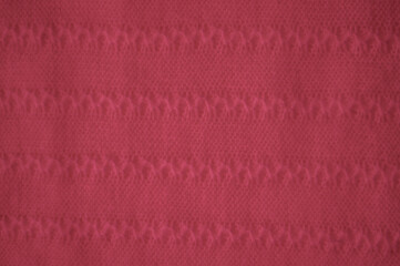 Handmade knit material with macro wool threads.