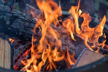 A beautiful bonfire is burning in the fire. - 547162541
