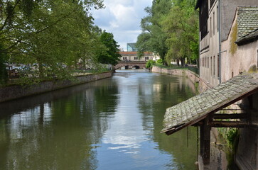 water Mill in Canal in village in France summer promenade 