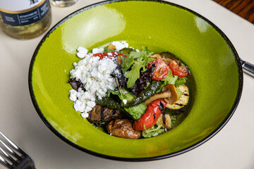 a delicious salad prepared in the restaurant by the chef
