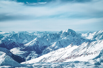 Fototapeta na wymiar Wild and untouched snowy mountain landscape in breathtaking winter atmosphere photographed in Mölltal Glacier ski resort. Mölltaler glacier, Flattach, Kärnten, Austria, Europe.