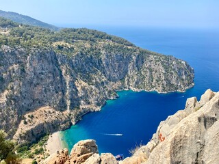 Butterfly Valley Aerial top view of the sea bay Azure water surrounded by mountains Turkish resorts Aegean Sea Paradise beautiful place for tourism and recreation
