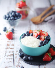Milk rice with berries ready for breakfast	