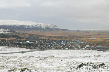 View on an Icelandic city from frozen snowy heights 2