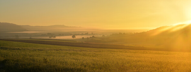 Fog over the morning autumn landscape or countryside.