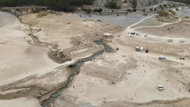 Aerial view of cars parked next to the river in Navarra