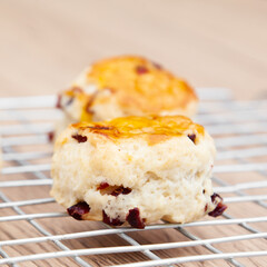 Cranberry scone set with raspberry jam and clotted cream