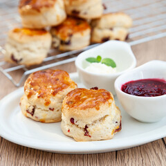 Cranberry scone set with raspberry jam and clotted cream