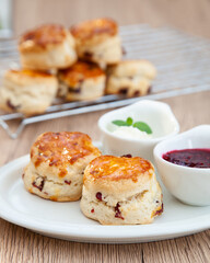 Cranberry scone set with raspberry jam and clotted cream