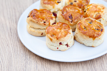 Cranberry scone set with raspberry jam and clotted cream