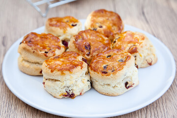 Cranberry scone set with raspberry jam and clotted cream