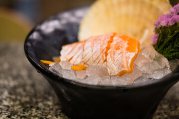 Fresh of salmon sashimi served on iced eating with wasabi. A famous Japanese menu.  Many omega 3 dish.