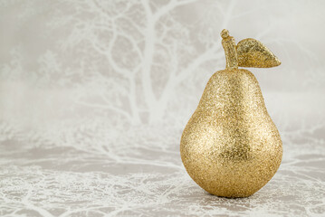 Gold apple isolated on white background.