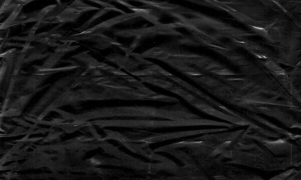 Background texture of a polyethylene, plastic transparent black plastic film, transparent stretched black and white metaverse crypto blockchain background

