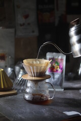 Barista brewing coffee, method pour over, drip coffee