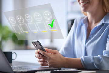 Woman Using Mobile Phone With Graphic Overlay To Leave Positive 5 Star Online Review