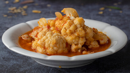 Cauliflower dish with meat and chickpeas