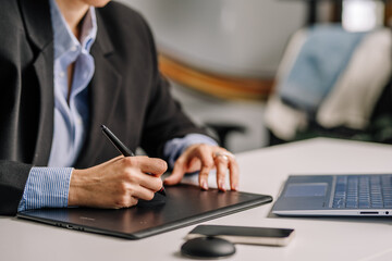 close up of a person typing on a laptop