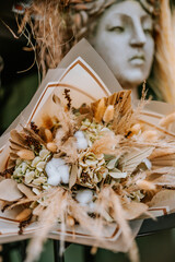 a bouquet of flowers in pastel tones