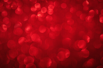 Red bokeh lights background. Unfocused abstract red glitter holiday background. Christmas,...