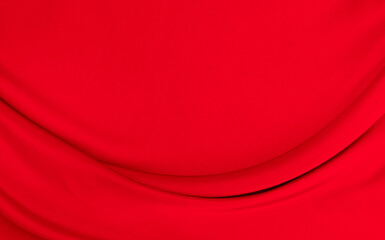 Black red satin dark fabric texture luxurious shiny that is abstract silk cloth background with patterns soft waves blur beautiful.