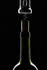 Silhouette of bottleneck with corkscrew